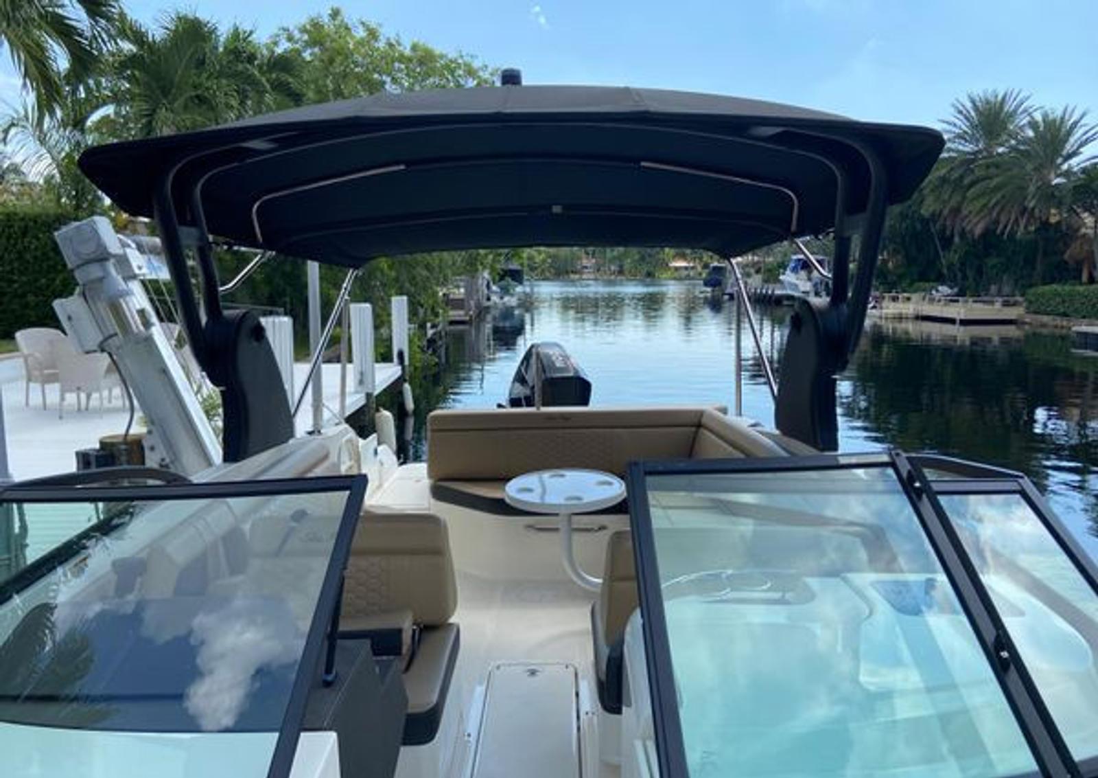 Shaded cockpit and seating area aboard the boat